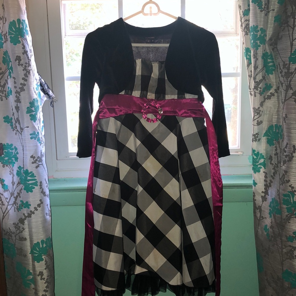 ruffled plaid dress; fleece sweater ((used))